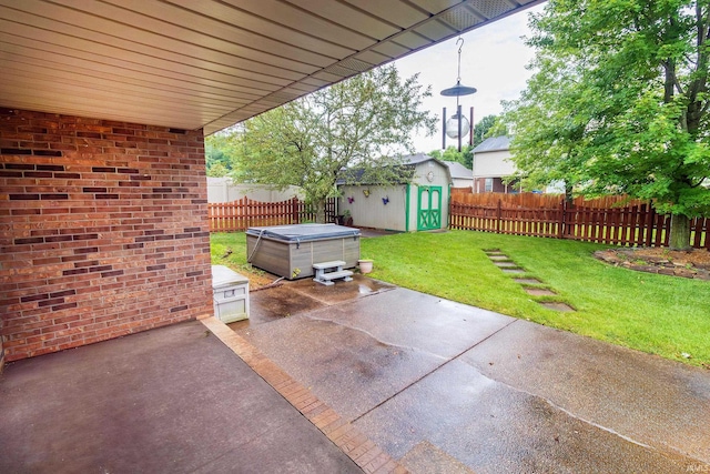 9040 Clear Creek Dr, Evansville, IN 47711 - fenced backyard featuring a patio, a hot tub, and a storage shed