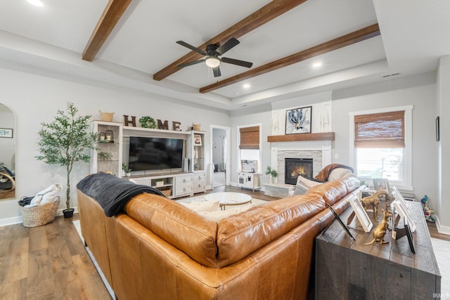 10251 Fieldlight Blvd, Fort Wayne, IN 46835 - living room with wood finished floors, ceiling fan, a fireplace, beam ceiling, and recessed lighting
