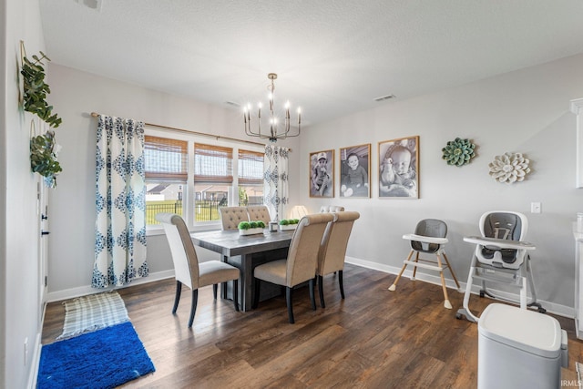 10251 Fieldlight Blvd, Fort Wayne, IN 46835 - dining space featuring a chandelier and dark wood-style floors