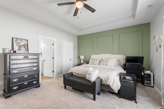 10251 Fieldlight Blvd, Fort Wayne, IN 46835 - bedroom with light carpet, a raised ceiling, and ceiling fan