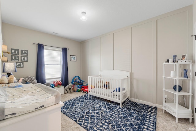 10251 Fieldlight Blvd, Fort Wayne, IN 46835 - bedroom featuring light colored carpet and a decorative wall