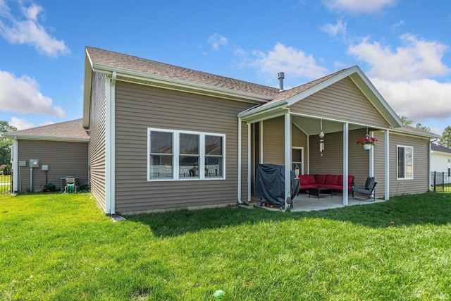 10251 Fieldlight Blvd, Fort Wayne, IN 46835 - back of property featuring an outdoor hangout area, a patio area, and a lawn