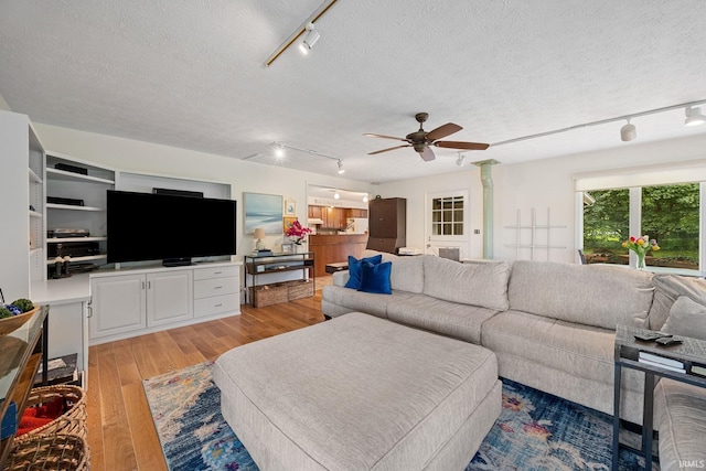 2107 W 450 S, Lafayette, IN 47909 - living area with rail lighting, light wood-style floors, ceiling fan, and a textured ceiling