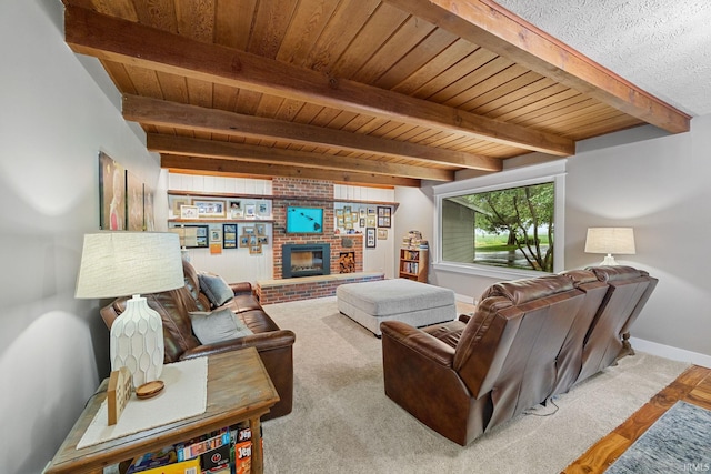 2107 W 450 S, Lafayette, IN 47909 - living room with a wooden ceiling with exposed beams, a brick fireplace, and carpet floors