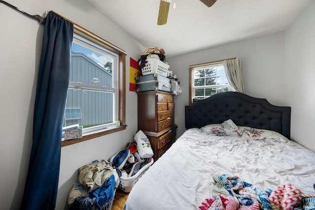3420 Mccormick Ave, Fort Wayne, IN 46803 - bedroom featuring ceiling fan and wood finished floors