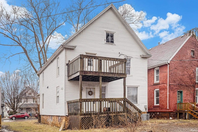 641 W Lexington Ave, Elkhart, IN 46514 - back of house featuring a balcony