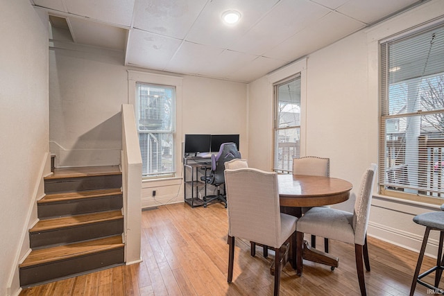 641 W Lexington Ave, Elkhart, IN 46514 - dining room featuring hardwood / wood-style floors, a drop ceiling, and a desk