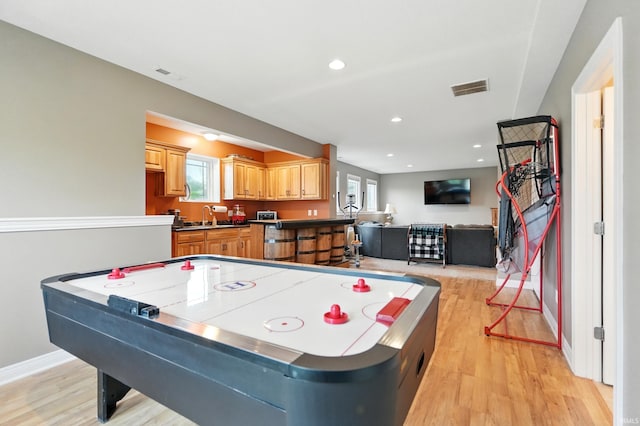 3908 County Road 4, Ashley, IN 46705 - rec room featuring light wood-type flooring and recessed lighting