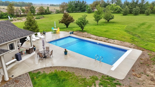 3908 County Road 4, Ashley, IN 46705 - outdoor pool with a lawn and a patio area