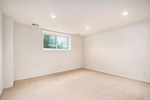 16340 Wellington Pkwy, Granger, IN 46530 - spare room with light carpet and recessed lighting