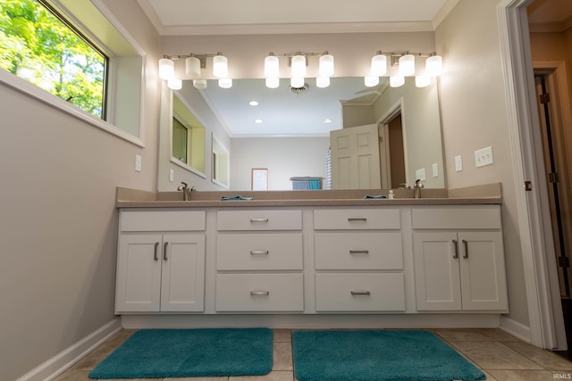 24413 Mckelvey Ave, Elkhart, IN 46516 - bathroom with double vanity, crown molding, and tile patterned flooring