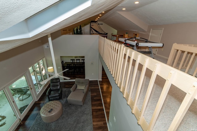 24413 Mckelvey Ave, Elkhart, IN 46516 - stairs with wood finished floors, recessed lighting, and vaulted ceiling