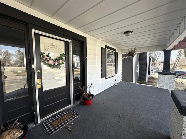 419 W Jefferson St, Kokomo, IN 46901 - view of exterior entry with a porch