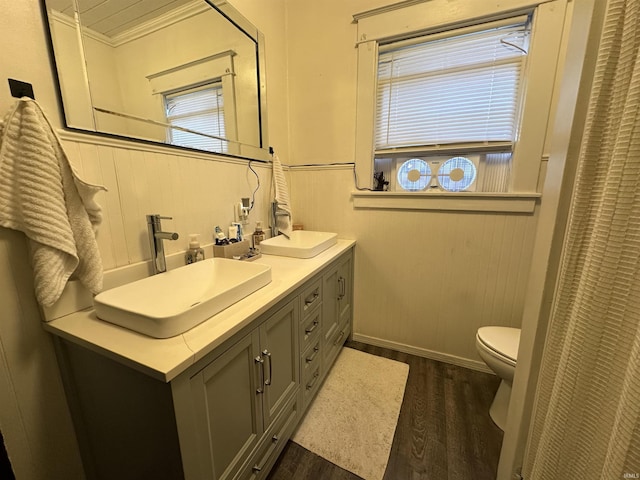 419 W Jefferson St, Kokomo, IN 46901 - full bath featuring wood finished floors, double vanity, and crown molding