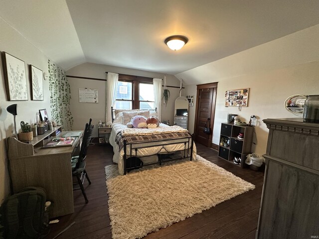 419 W Jefferson St, Kokomo, IN 46901 - bedroom featuring vaulted ceiling and dark wood-style floors