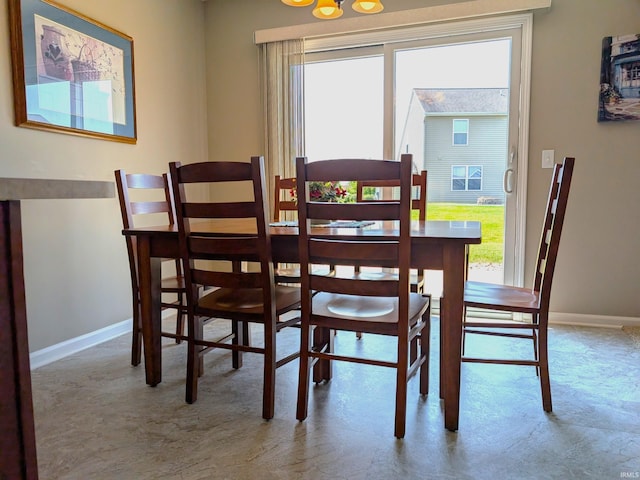 117 Blue Heron Cv, Decatur, IN 46733 - dining area with baseboards and carpet floors