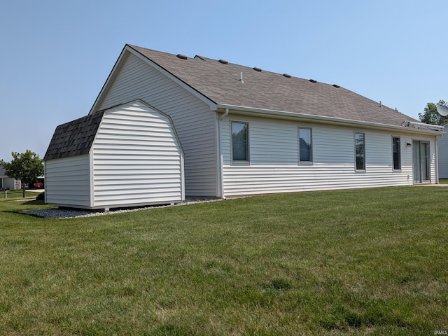 117 Blue Heron Cv, Decatur, IN 46733 - back of house featuring a yard and a shingled roof