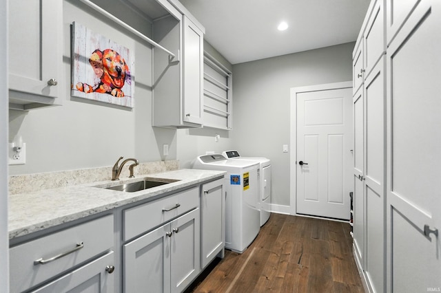 13176 Malfini Trl, Fort Wayne, IN 46845 - laundry room featuring washing machine and clothes dryer, dark wood-style floors, cabinet space, and recessed lighting