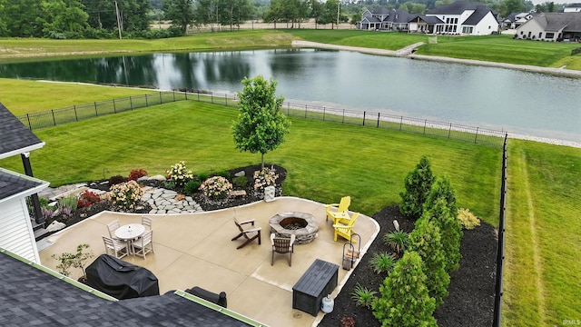 13176 Malfini Trl, Fort Wayne, IN 46845 - fenced backyard featuring a fire pit, a water view, and a patio