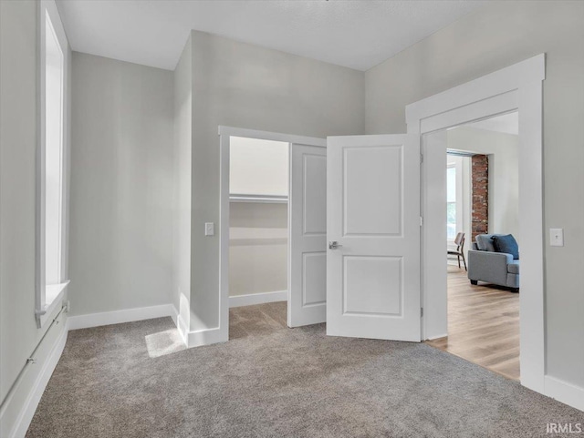 439 E Wayne St, Fort Wayne, IN 46802 - unfurnished bedroom with carpet and a closet