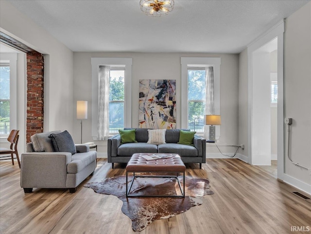 439 E Wayne St, Fort Wayne, IN 46802 - living room featuring plenty of natural light and wood finished floors