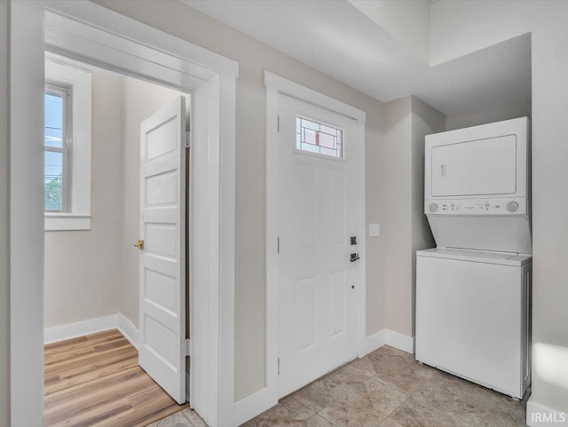 439 E Wayne St, Fort Wayne, IN 46802 - laundry area featuring estacked washer and dryer and baseboards