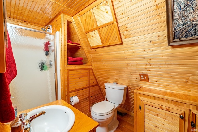 5142 W Corly Ln, Silver Lake, IN 46982 - bathroom featuring a stall shower, wood walls, and vanity