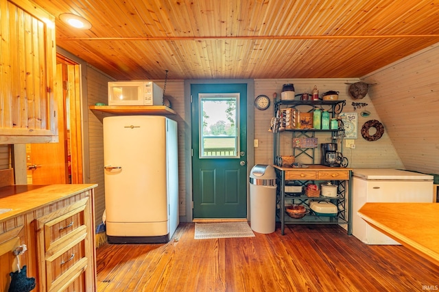 5142 W Corly Ln, Silver Lake, IN 46982 - foyer entrance with wood ceiling, wooden walls, and wood-type flooring