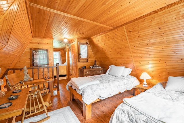 5142 W Corly Ln, Silver Lake, IN 46982 - bedroom featuring wood ceiling, wood walls, lofted ceiling, and hardwood / wood-style floors