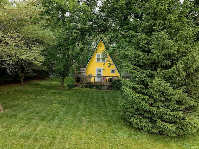 5142 W Corly Ln, Silver Lake, IN 46982 - exterior space featuring a wooden deck and a front yard