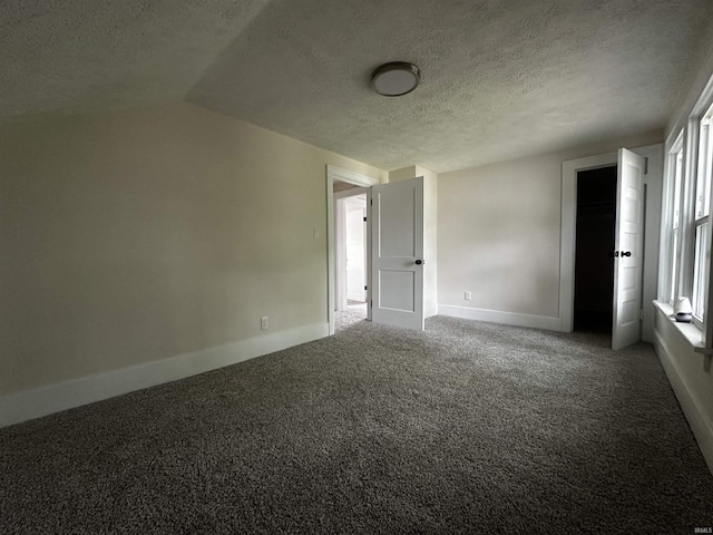 1014 E Donald St, South Bend, IN 46613 - carpeted spare room with a textured ceiling and lofted ceiling