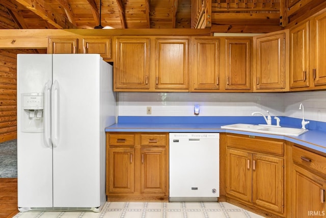 5818 Prophets Rock Rd, West Lafayette, IN 47906 - kitchen featuring white appliances, brown cabinetry, and light flooring