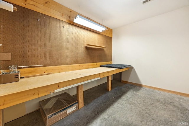 5818 Prophets Rock Rd, West Lafayette, IN 47906 - miscellaneous room with a workshop area and carpet flooring