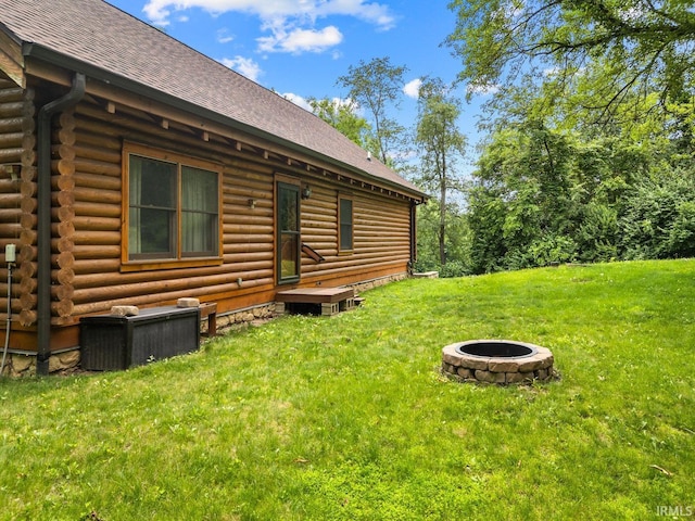 5818 Prophets Rock Rd, West Lafayette, IN 47906 - view of green lawn with a fire pit