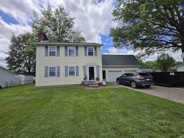 1403 Wilson St, Boonville, IN 47601 - colonial-style house featuring a chimney, an attached garage, concrete driveway, and entry steps