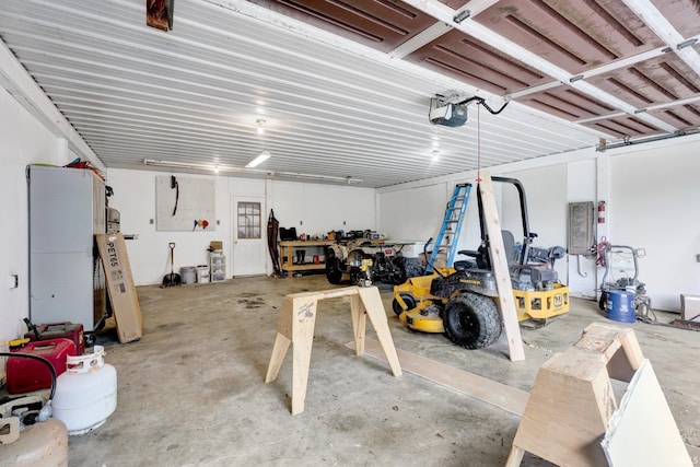 10154 W Rock E Rd, Bloomington, IN 47403 - garage featuring a garage door opener