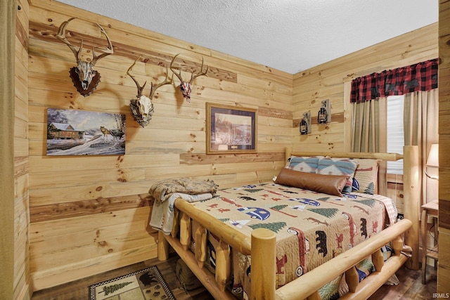 10154 W Rock E Rd, Bloomington, IN 47403 - bedroom with wood walls and a textured ceiling