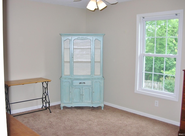 2622 Oak Trail Dr, Newburgh, IN 47630 - spare room featuring light carpet and a ceiling fan