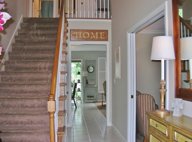 2622 Oak Trail Dr, Newburgh, IN 47630 - tiled entrance foyer featuring stairs and baseboards