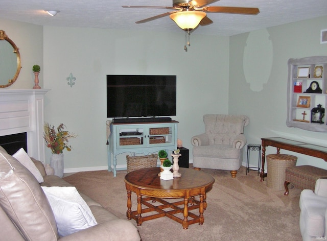 2622 Oak Trail Dr, Newburgh, IN 47630 - living area with carpet, ceiling fan, and a fireplace