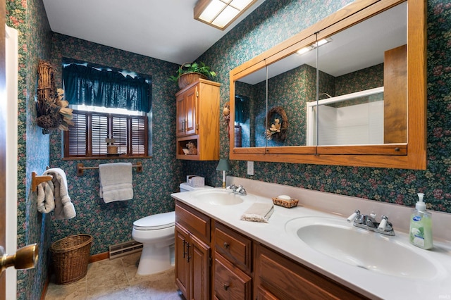 1105 N Buckeye Rd, Muncie, IN 47304 - full bathroom featuring wallpapered walls, a shower stall, double vanity, and tile patterned flooring