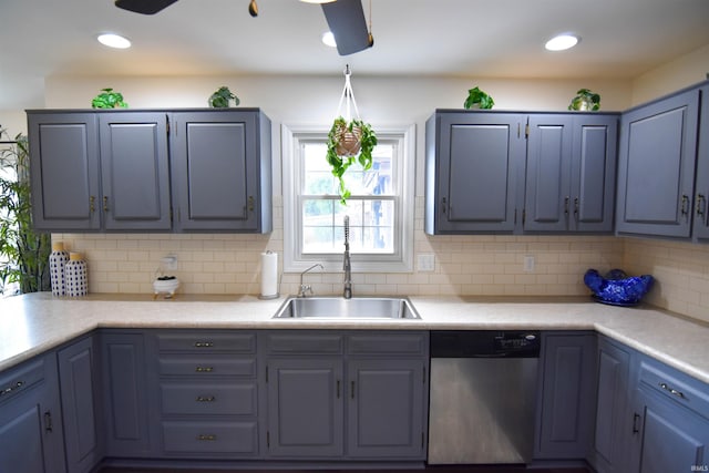 7366 Capri Ct, Newburgh, IN 47630 - kitchen with stainless steel dishwasher, backsplash, light countertops, blue cabinetry, and recessed lighting