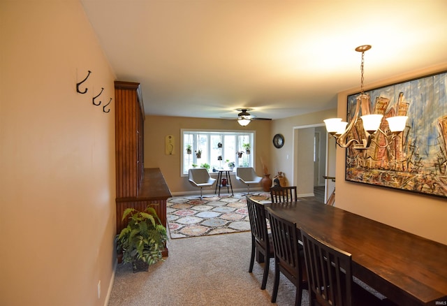 7366 Capri Ct, Newburgh, IN 47630 - carpeted dining room featuring a chandelier and a ceiling fan