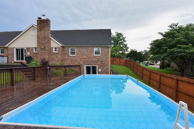 7366 Capri Ct, Newburgh, IN 47630 - view of swimming pool featuring a fenced backyard and a wooden deck