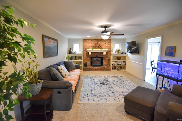 7366 Capri Ct, Newburgh, IN 47630 - living room featuring carpet flooring, a ceiling fan, ornamental molding, and a wood stove