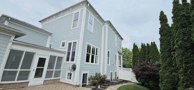1648 S Ira St, Bloomington, IN 47401 - view of property exterior featuring a sunroom