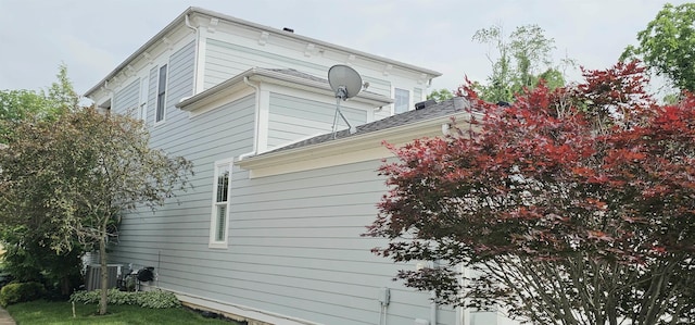 1648 S Ira St, Bloomington, IN 47401 - view of home's exterior with a central AC unit
