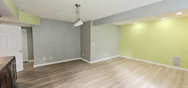 1648 S Ira St, Bloomington, IN 47401 - unfurnished dining area featuring light wood-style flooring and recessed lighting