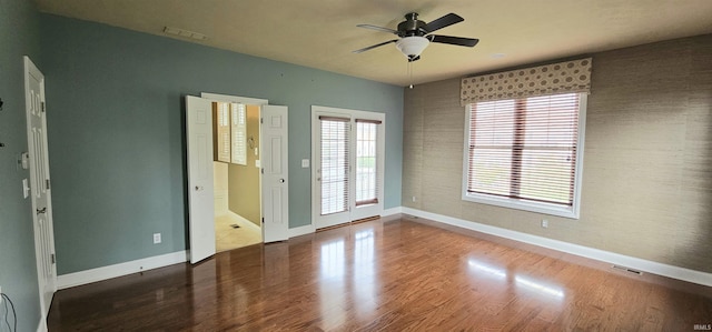 1648 S Ira St, Bloomington, IN 47401 - unfurnished room featuring a ceiling fan and wood finished floors
