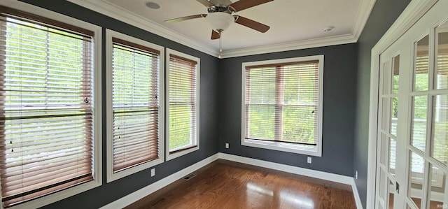 1648 S Ira St, Bloomington, IN 47401 - unfurnished room featuring dark wood-type flooring, crown molding, ceiling fan, and a smoke detector